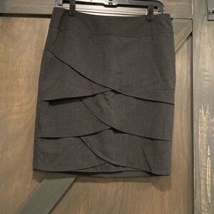 Unique scallop designed skirt. Size4.